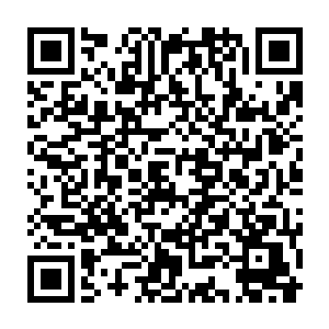 与之握手之后也不放过任何可以调侃这位闻名遐迩的商界巨鳄的机会二维码生成
