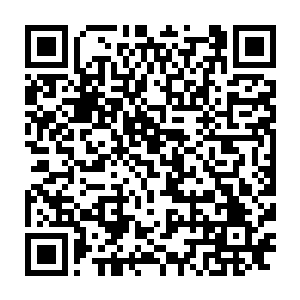 东通市某区治安中队中队长一脸不满地冲电话另外一头的张冲埋怨道二维码生成