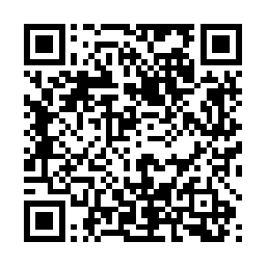 他老妈一时半会儿也不敢确定这个人是不是自己的儿子二维码生成