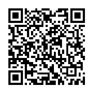 令他们感到不可思议的是声是在一个头戴式耳机里传来了二维码生成