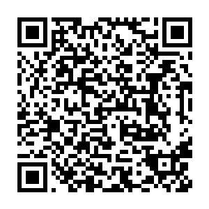 似乎是用某种非常沉重的金属打造出来似的……再往上面仔细的一看二维码生成