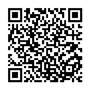 全球最大微波炉企业格兰仕的梁庆德是顺德桂川镇工交办副主任二维码生成
