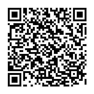 再一次从机窗往下俯瞰着北京这座融合着浓浓古韵和现代化气息的国际大都市二维码生成