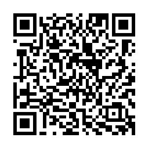 刀削斧刻般硬朗的面容无形之中带着一种凛然沉冷的杀伐之气二维码生成