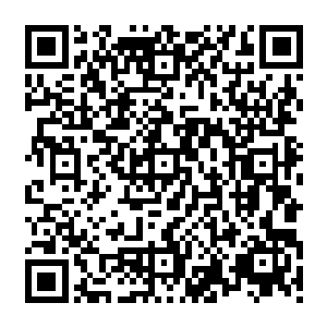 则有复杂的蒸汽机械将一个个体型庞大的奇怪的齿轮形的东西自动加载在飞轮的承载弹位上二维码生成