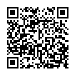 坐在主席台上代表组委会和雅福电子公司签约的是吴伟民二维码生成