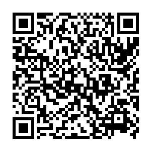 将那个地方的一个小小的塔状几何图形底部不到十分之一的线条充实了起来二维码生成