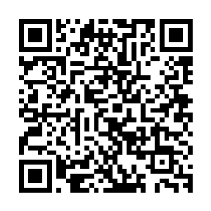 成功拍卖这枚翡翠的善款将全部投入到为孤儿寡母行善的项目中二维码生成