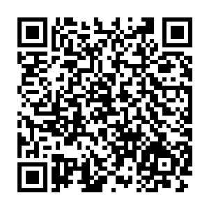 手机屏幕上显示的是转载美国操作系统安全等级评测标准的官方文稿二维码生成