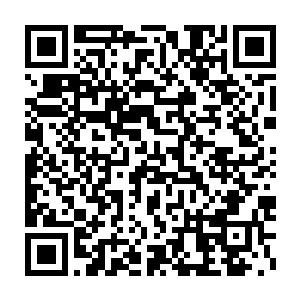 有一次他拿过这个护身符仔细打量发现这就是用普通青玉做的牌子二维码生成
