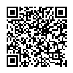 而是一个超级大的仿佛某宇宙卫星的模样弄成的一个多面体二维码生成