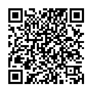 被捆缚的代离也是牢笼之下是代离那被光线拉得长长的影子二维码生成