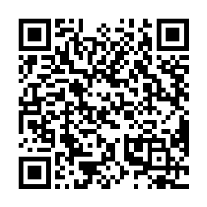 让世界许多国家一起来承担美国经济下行时出现的问题二维码生成