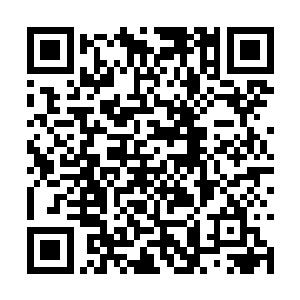 这样的装束在加利福尼亚州的确是显得有些夸张了二维码生成