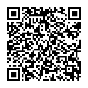 都没注意到这辆黑色的大型越野车无声无息的从旁边混在车流中经过二维码生成